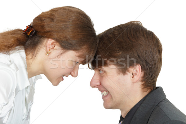 Stock photo: Serious confrontation between men and women