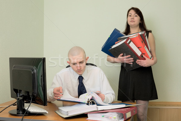 Bookkeeper and the secretary on a workplace Stock photo © pzaxe