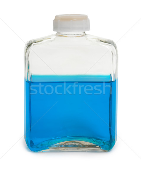 Bottle filled with blue chemical solution Stock photo © pzaxe