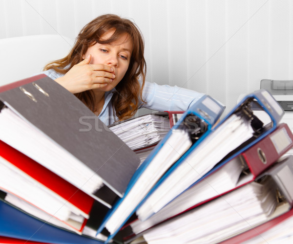 Cute but tired young accountant Stock photo © pzaxe