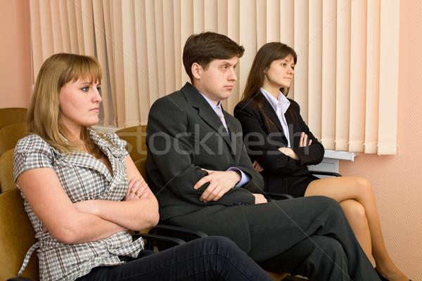 Group of skeptical businessmen Stock photo © pzaxe