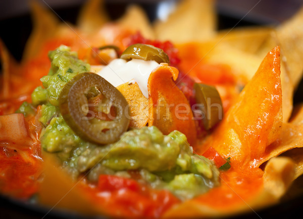 Nachos salsa olajbogyók közelkép étel piros Stock fotó © pzaxe