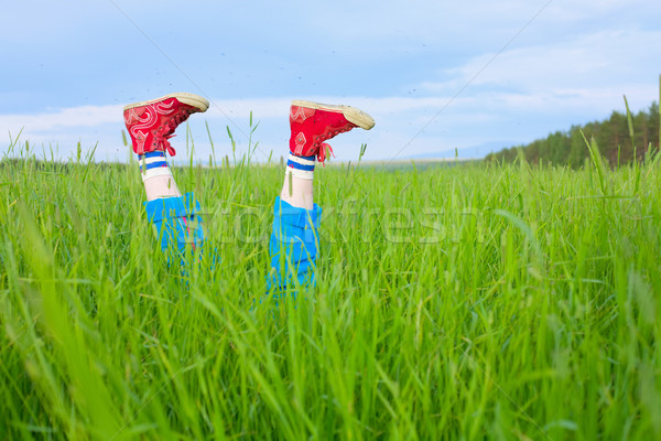 Feet in gym shoes and hungry mosquitoes Stock photo © pzaxe