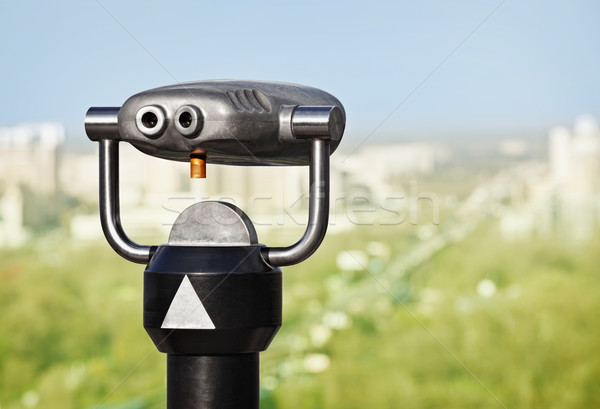 Binoculars to observe green city Stock photo © pzaxe