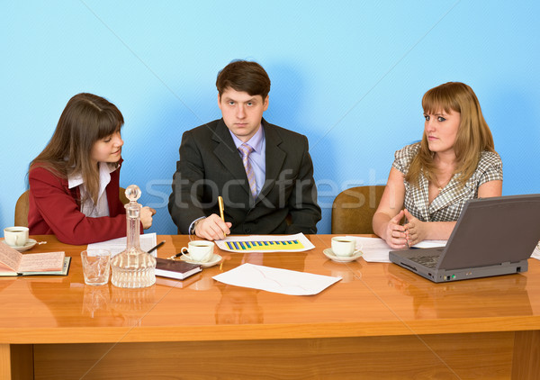 Business team sits at the table Stock photo © pzaxe