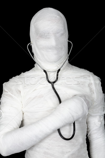 Man in costume mummy with stethoscope Stock photo © pzaxe