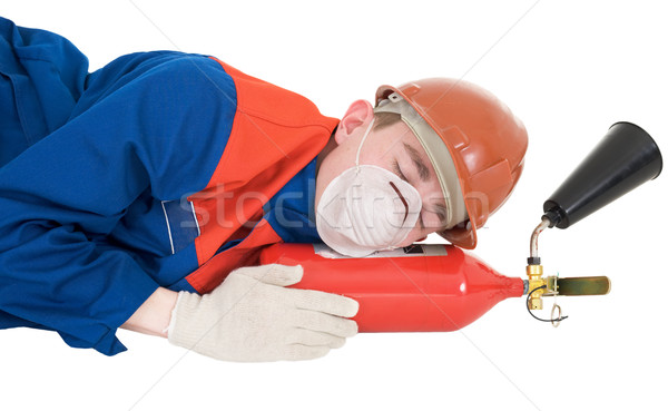 Sleeping laborer with fire extinguisheron  Stock photo © pzaxe