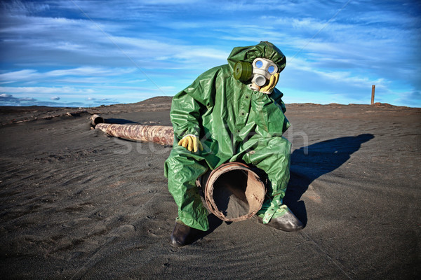Man in the area of ​​environmental disaster Stock photo © pzaxe