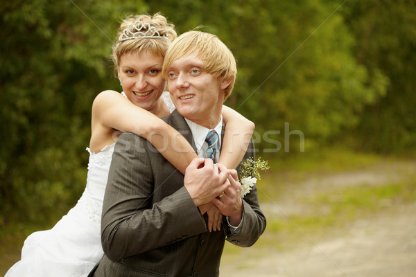Happy young bride and groom Stock photo © pzaxe