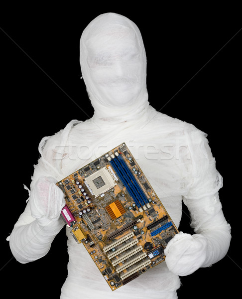 Bandaged man with motherboard Stock photo © pzaxe