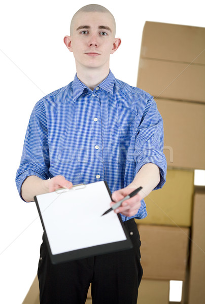 [[stock_photo]]: Homme · comprimé · carton · cases · papier