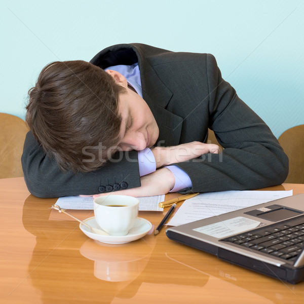 Businessman has fallen asleep sitting at meeting Stock photo © pzaxe