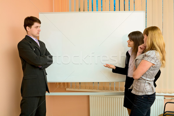 Office workers discuss work Stock photo © pzaxe
