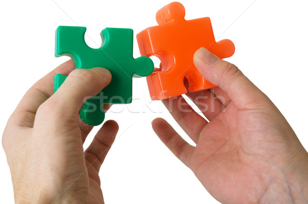 Hand and puzzle Stock photo © pzaxe