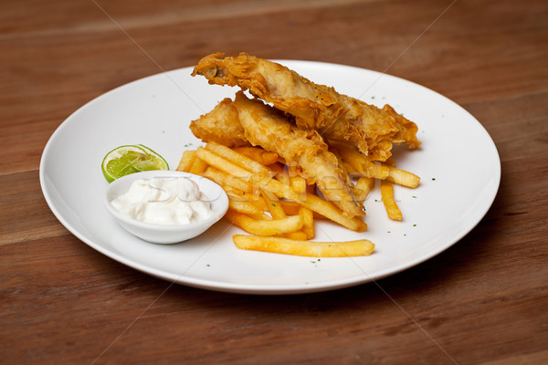 Shrimp tempura dish with white sauce and fried potatoes Stock photo © pzaxe