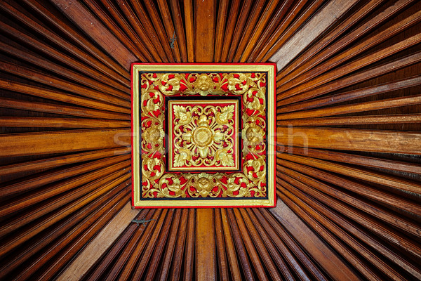 Beautiful, Symetrical, Hand Carved Wooden Ceiling Tile with Live Stock photo © pzaxe