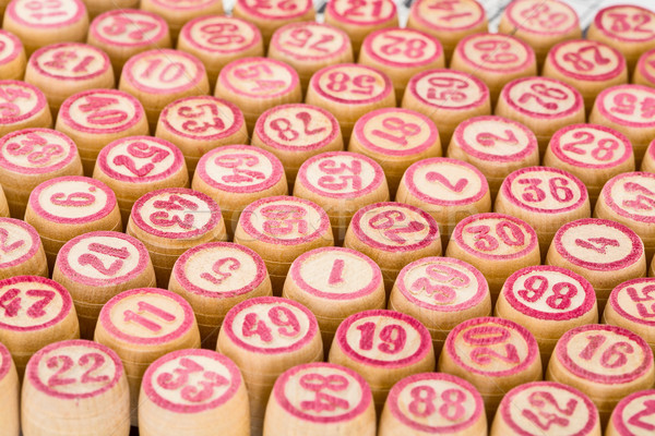 Wooden counters for bingo with red numbers Stock photo © pzaxe