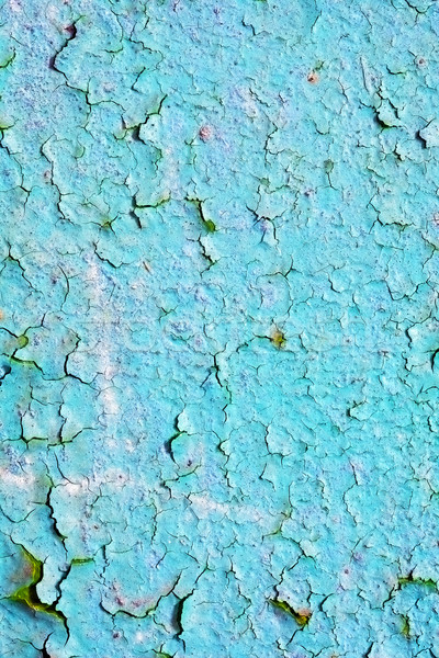 Blue paint is chipping on wall Stock photo © pzaxe