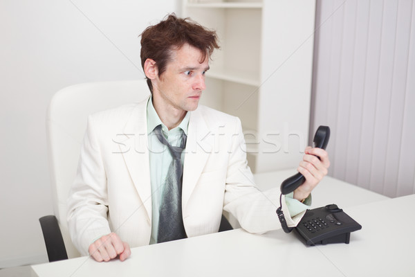 Zakenman afgewerkt moeilijk telefoon gesprek triest Stockfoto © pzaxe