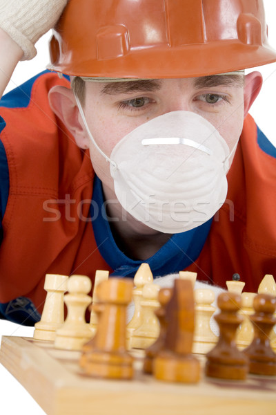 Worker and chess Stock photo © pzaxe