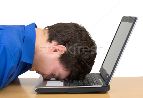 Young man and laptop Stock photo © pzaxe