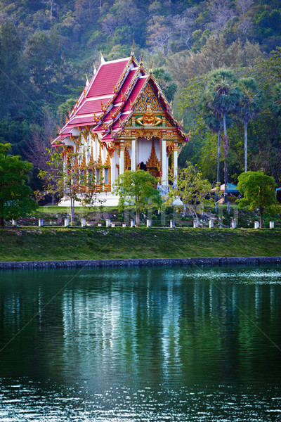 Buddhist temple on near the pond - Thailand. Stock photo © pzaxe
