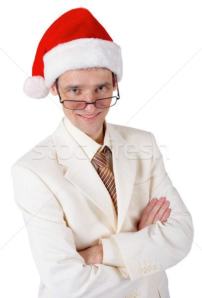 Stock photo: Smiling businessman in a Christmas hat