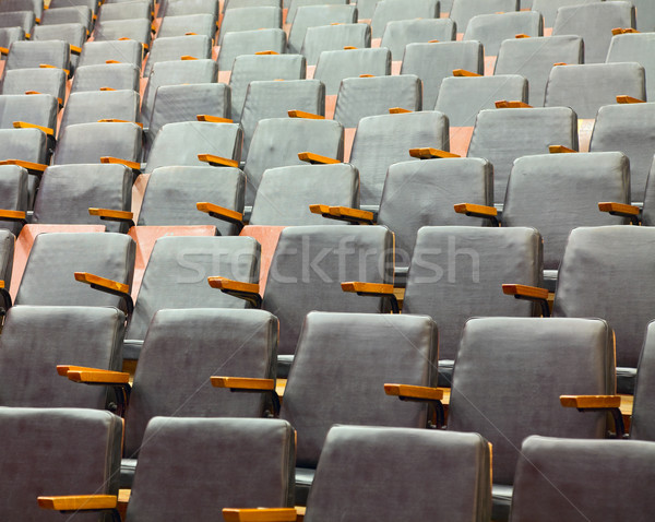 Rows of old theater seats covered with leather Stock photo © pzaxe