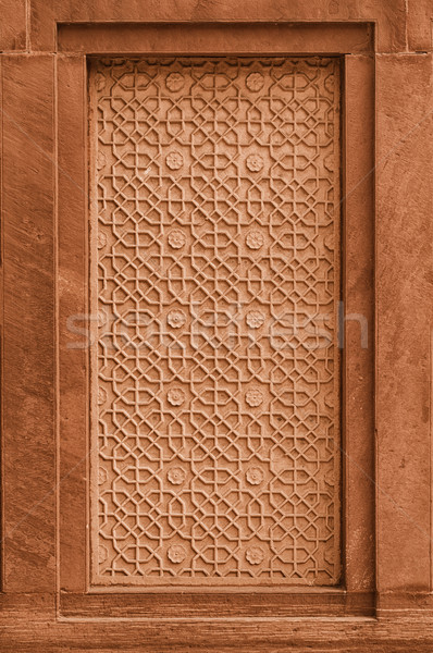 Decorative stone panel on the wall on facade of the building. In Stock photo © pzaxe