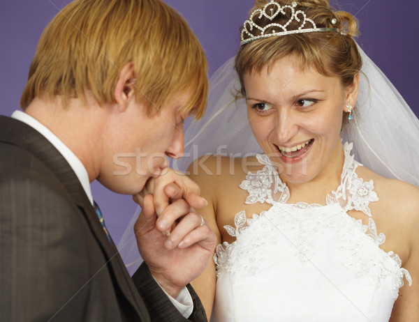 Gallant groom kisses hand Stock photo © pzaxe