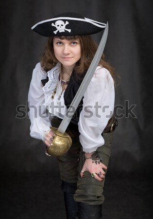 Girl - pirate with sabre and pistol on a black Stock photo © pzaxe