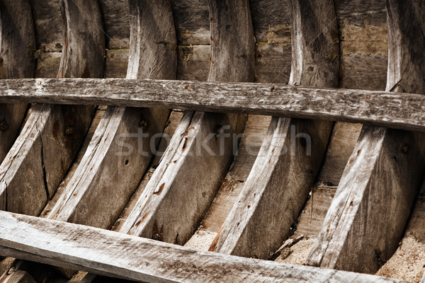 Skeleton of an old wooden fishing boat. Thailand Stock photo © pzaxe