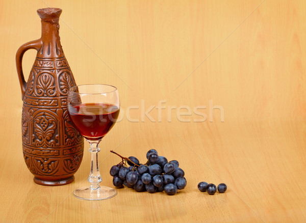 Artistic composition - crock, glass and grapes Stock photo © pzaxe