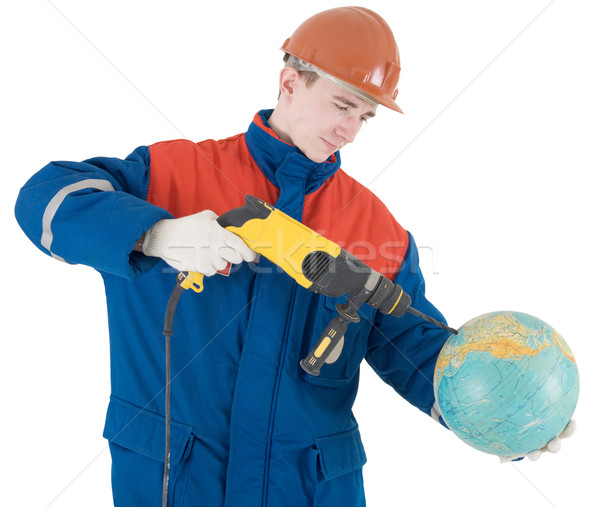 Builder, terrestrial globe and perforator Stock photo © pzaxe