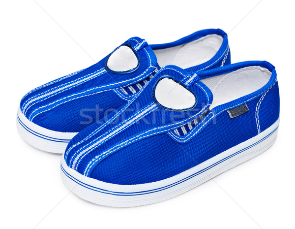 Leggero sport scarpe blu tessuto isolato Foto d'archivio © pzaxe