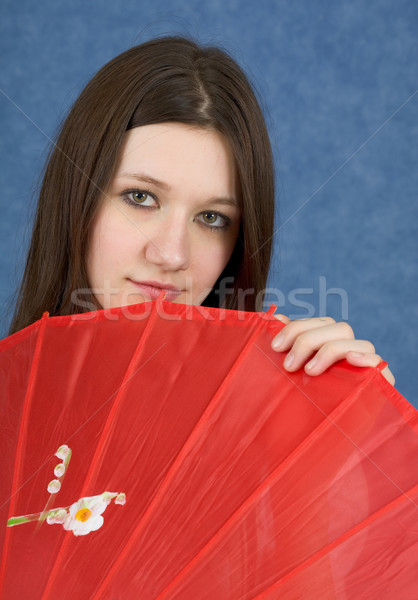 Portrait of girl with a red umbrella Stock photo © pzaxe