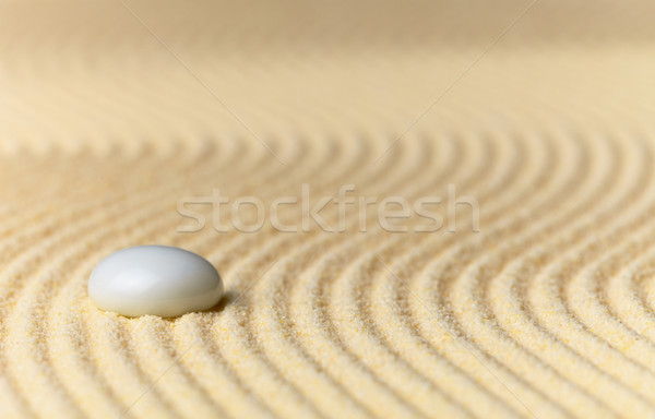 Stock photo: Sandy yellow background and glass stone - abstract composition