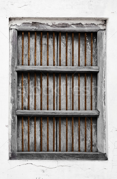 Old wooden window with rusty grate Stock photo © pzaxe