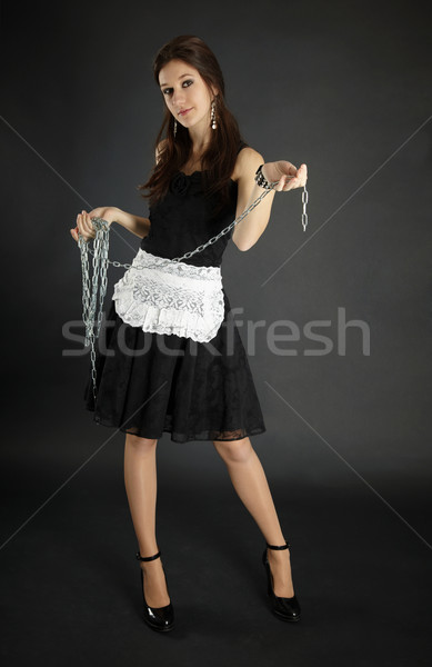 Woman in maid costume with chain Stock photo © pzaxe