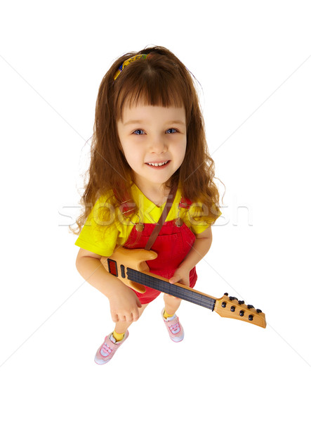 Funny little girl with toy guitar on white Stock photo © pzaxe