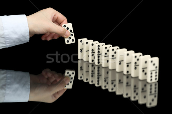 Domino bot hand zwarte witte spel Stockfoto © pzaxe