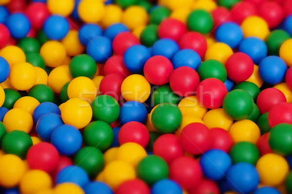 Toy balls of different color - backdrop Stock photo © pzaxe