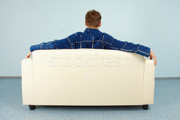 Stock fotó: Fiatalember · ül · otthon · kanapé · férfi · padló