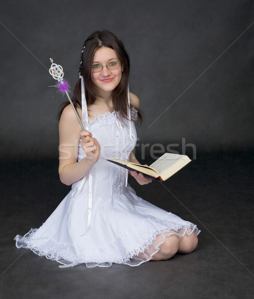 Dziewczyna magik książki czarny włosy okulary Zdjęcia stock © pzaxe
