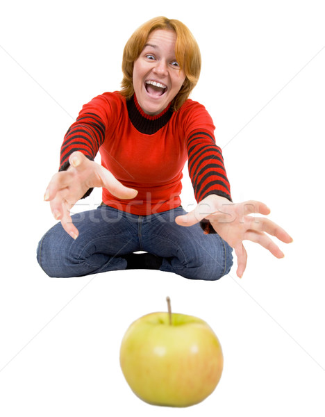 Woman stretch a hand to apple Stock photo © pzaxe