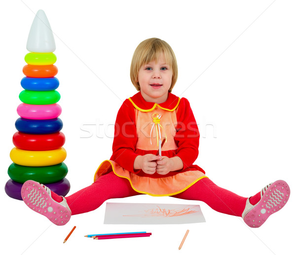 Petite fille jouet pyramide crayons blanche papier [[stock_photo]] © pzaxe