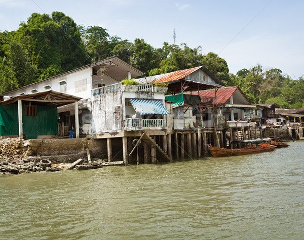 Old houses on river bank. Thailand Stock photo © pzaxe