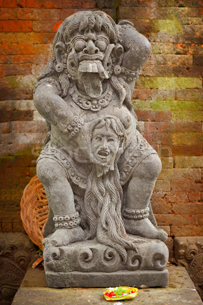 Vintage statue of the deity child-eating Rangda. Indonesia, Bali Stock photo © pzaxe