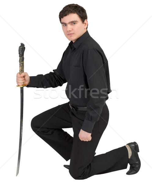 Man in black with the japanese sword in a hand Stock photo © pzaxe
