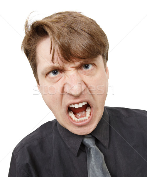 Fiercely cried young man close up Stock photo © pzaxe